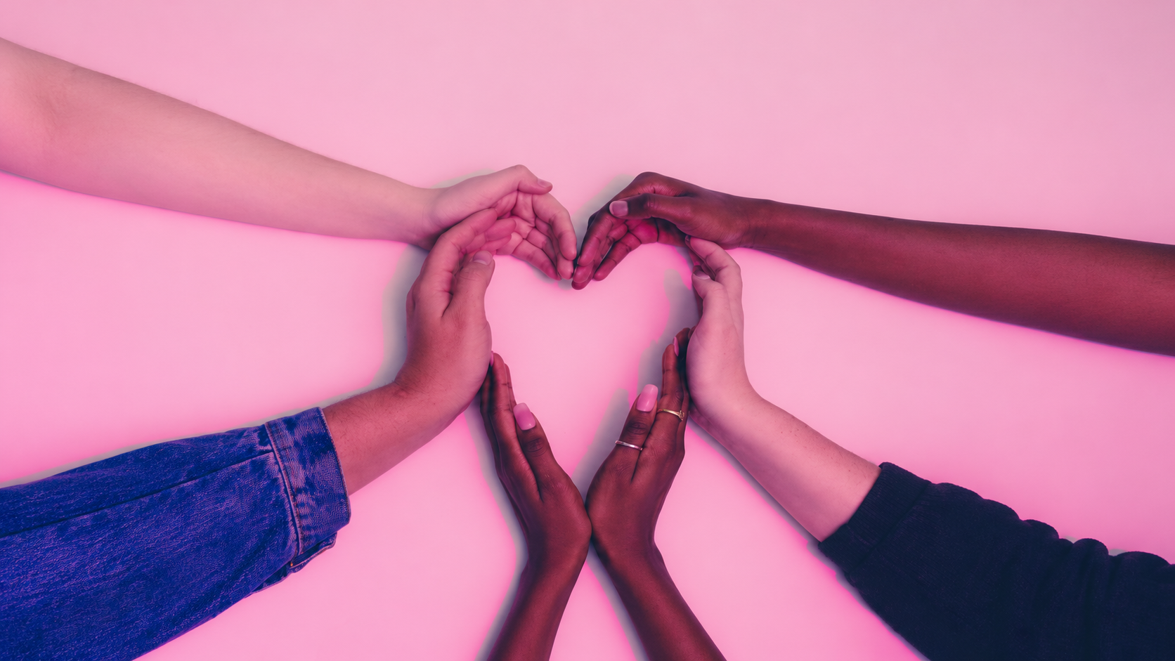 Hands joined together creating welcoming community spaces